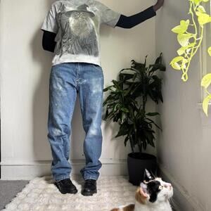 Vintage streetwear paint stains relaxed fits Medium wash jeans size 33X34‎